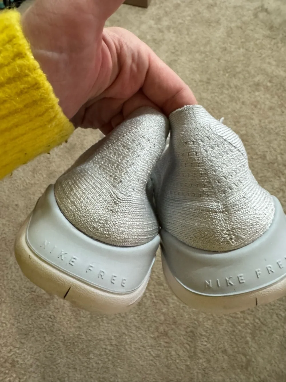 Nike Women's White Flyknit Running Sneakers with Black Swoosh - Picture 6 of 7